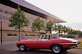 Red car in front of Opera House, Copenhagen, Denmark