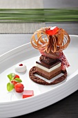 Chocolate and strawberries with caramel drill on serving dish