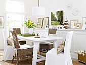 Wicker furniture with slipcovers, image gallery and table in dining room