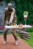 Trout, crayfish and celery on serving plate