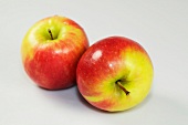Close-up of two apples on white background