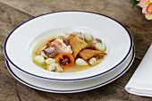 Red mullet with mussel nage and kohlrabi on dish