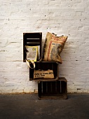 Various recycled bags made of jute bags against white wall