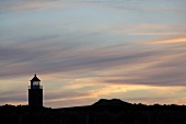 View of Kampen lighthouse at dusk in Sylt, Germany