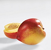 Whole and half armking nectarine