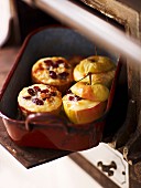 Baked apples filled with white chocolate and cranberries