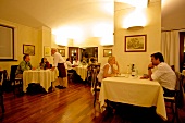 People dinning at I Bologna Restaurant at Piedmont, Italy