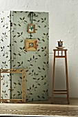 Partition with oak leaf pattern on white wall