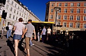 Rear view of people walking on streets of Vesterbro, Denmark