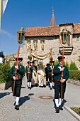 Procession on road in Franconian Switzerland, Bavaria, Germany