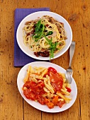 Pasta with veal and salami and Casarecce with apricot on plates