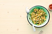 Couscous salad with chickpeas in bowl