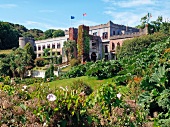 Facade of Abbeyglen Castle Hotel with garden in front, Ireland