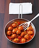 Meatballs and sherry sauce in pan, Andalusia, Spain