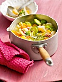 Stew with autumn vegetables in saucepan