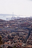 View of cityscape overlooking river Teji and 25th of April Bridge in Portugal