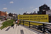People sitting at High Line in New York, USA