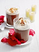 Masala chocolate pudding with cream in glasses