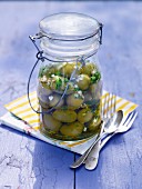 Marinated olives in a preserving jar