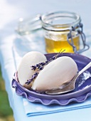 Creamy lavender-honey ice cream with lavender figs on plate