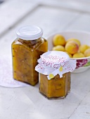 Fruity apricot sauce in glass jars