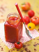 Rich tomato sauce with oregano in glass jar