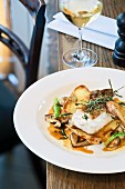 Fried Iceland cod with mushrooms, potatoes and veal jus