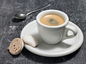 Cup of espresso and two biscuits
