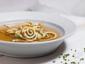 Krauterfladle soup in serving dish