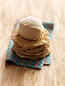 Close-up of banana soy ice-cream with honey on biscuits