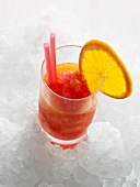 Glass of crushed orange campari in ice