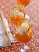 Close-up of two aperol spritz with zitronen granite and lemon slices