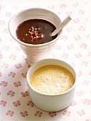 Caramel sauce and chocolate sauce with chilli in bowls
