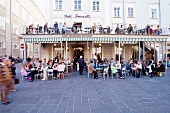People having food at Cafe Tomaselli in the Alter Market, Salzburg, Austria