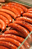 Close-up of frying sausages