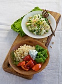 Curried rice salad and couscous vegetables salad on plates