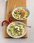 Pasta with broad beans and broccoli on plate