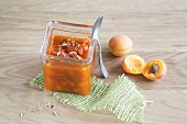 Peppers and apricot chutney in glass jar
