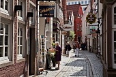 View of people on Schnoor street shop in Viertel, Bremen, Germany