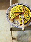 Three layered omelette pie on plate, France