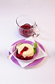 Vanilla semolina pudding with cherries on plate