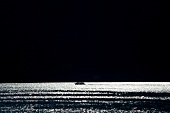 Ship in Lake Como at moonlight, Italy