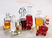 Different types of vinegar in various glass bottles