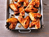 Close-up of chicken wings in baking tray