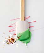 Baking for children: a spatula with green icing