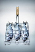 Grill grid with three fishes