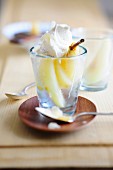 White wine and ginger pears with spiced cream