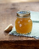 Homemade ginger jam in jar on napkin