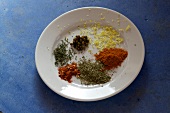 Various homemade spices for sausage on plate