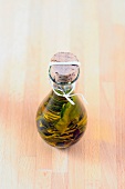 Mediterranean herb oil in bottle 